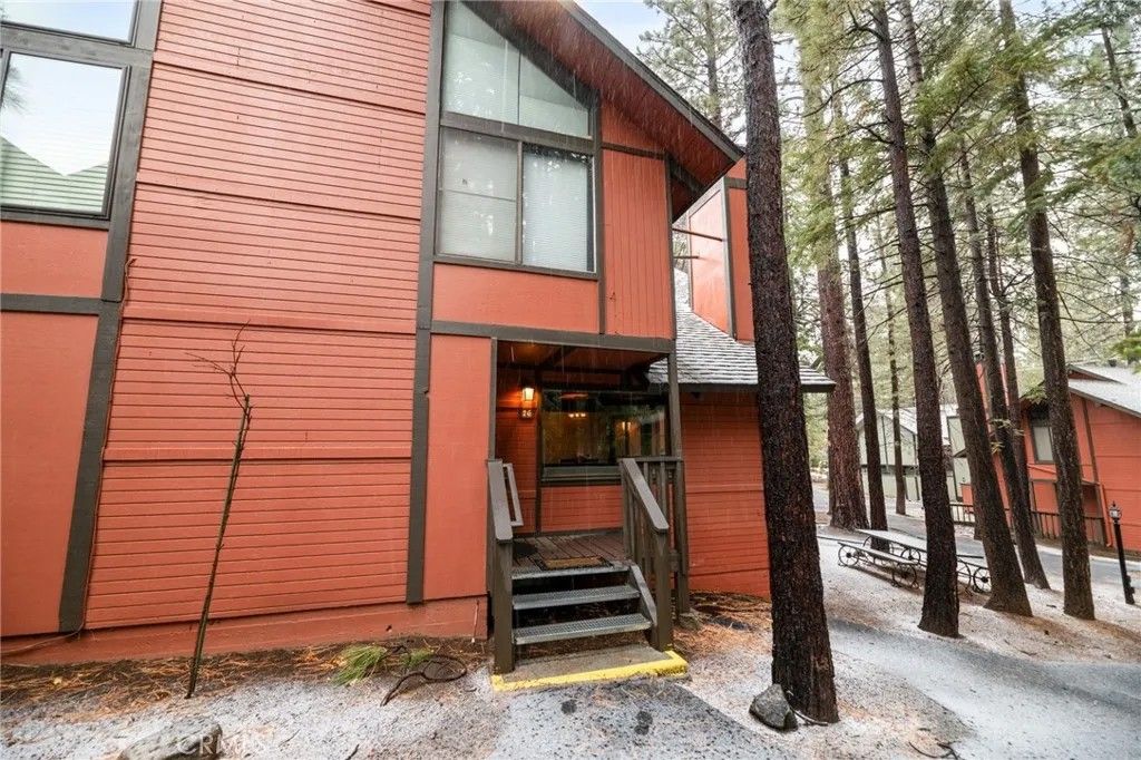 Photo of 41935 Switzerland Dr, Big Bear Lake, CA 92315 (MLS # OC25247133)