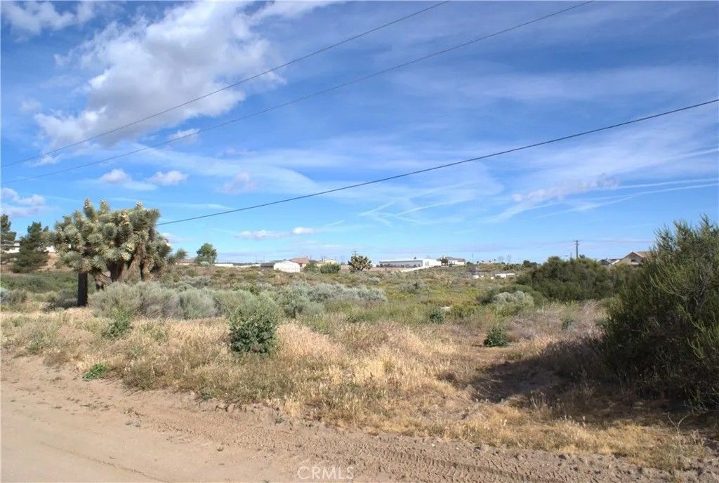 Photo of 0 Stuveling St, Oak Hills, CA 92344 (MLS # CV26079405)