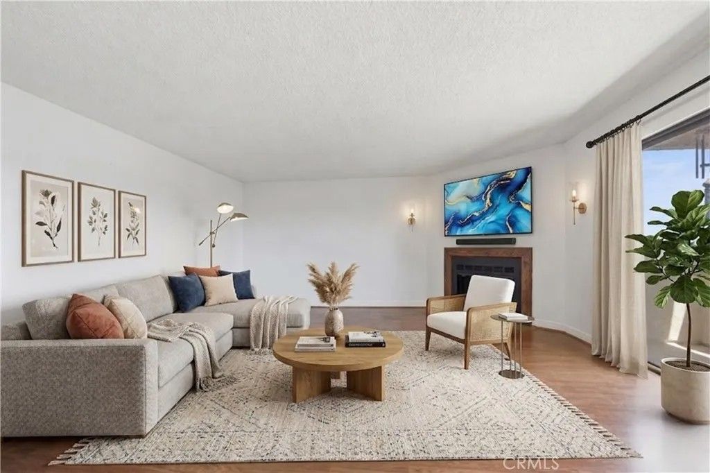 Photo of 605 Redondo Ave #304, Long Beach, CA 90814 (MLS # BB26079750)