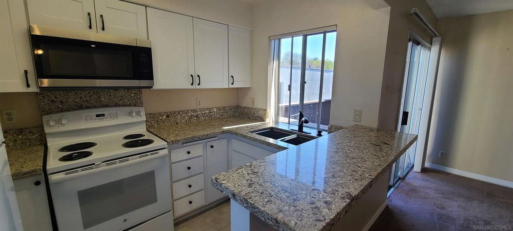 Photo of 1395 Caminito Gabaldon #C, San Diego, CA 92108 (MLS # 2600751)