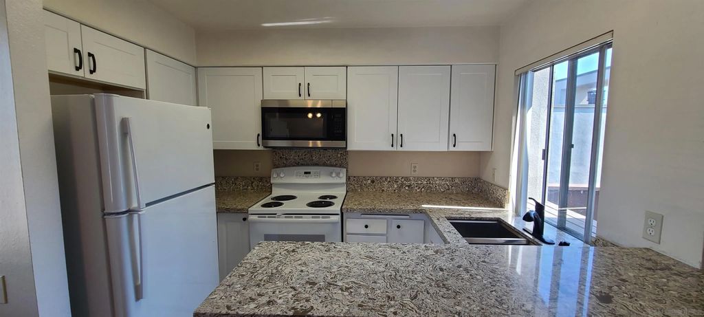 Photo of 1395 Caminito Gabaldon #C, San Diego, CA 92108 (MLS # 2600751)