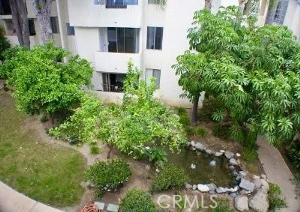 Photo of 5325 Newcastle Ave #322, Encino, CA 91316 (MLS # SR26093375)