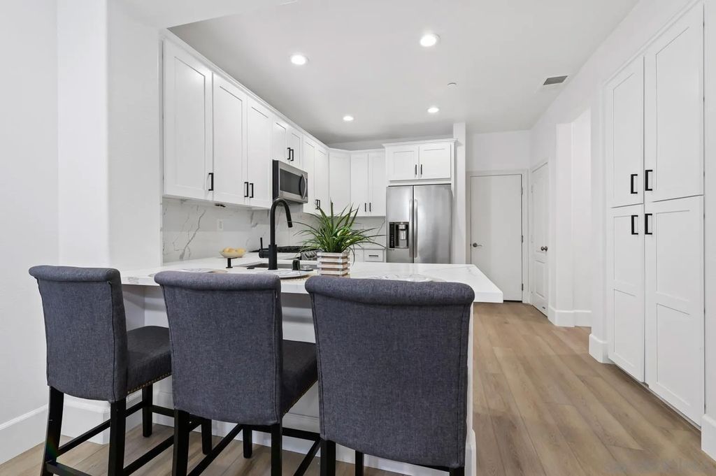 Photo of 13002 Requlo Place, San Diego, CA 92130 (MLS # 260010566)