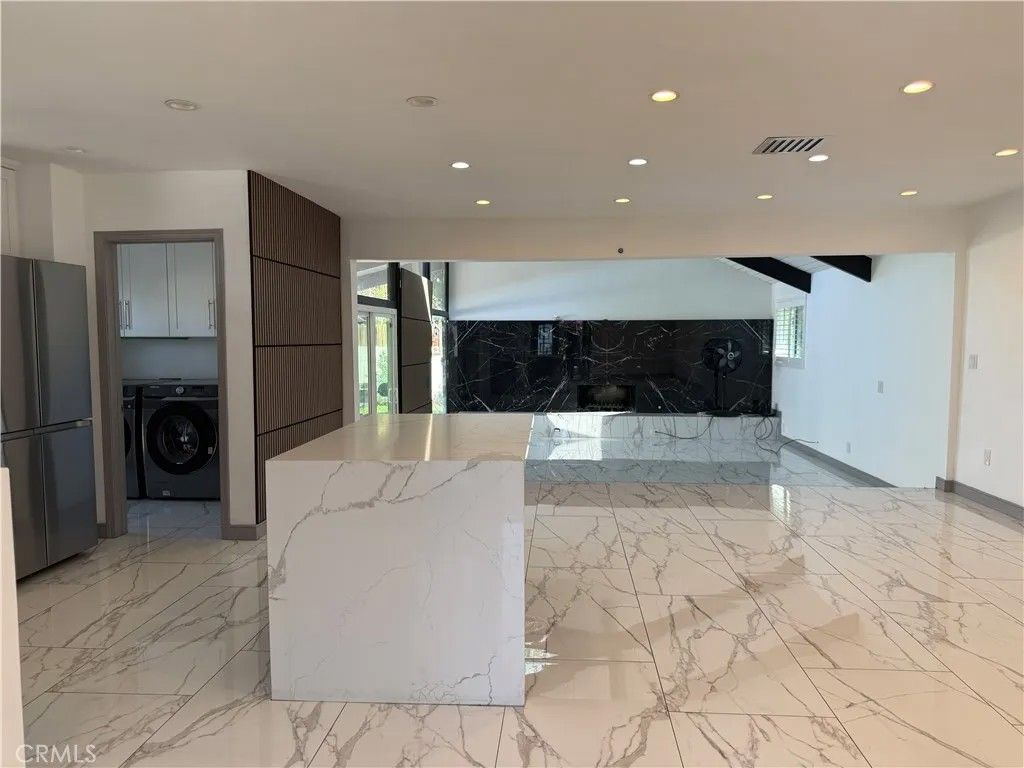 Photo of 6910 Laramie Ave, Winnetka, CA 91306 (MLS # SR26053000)