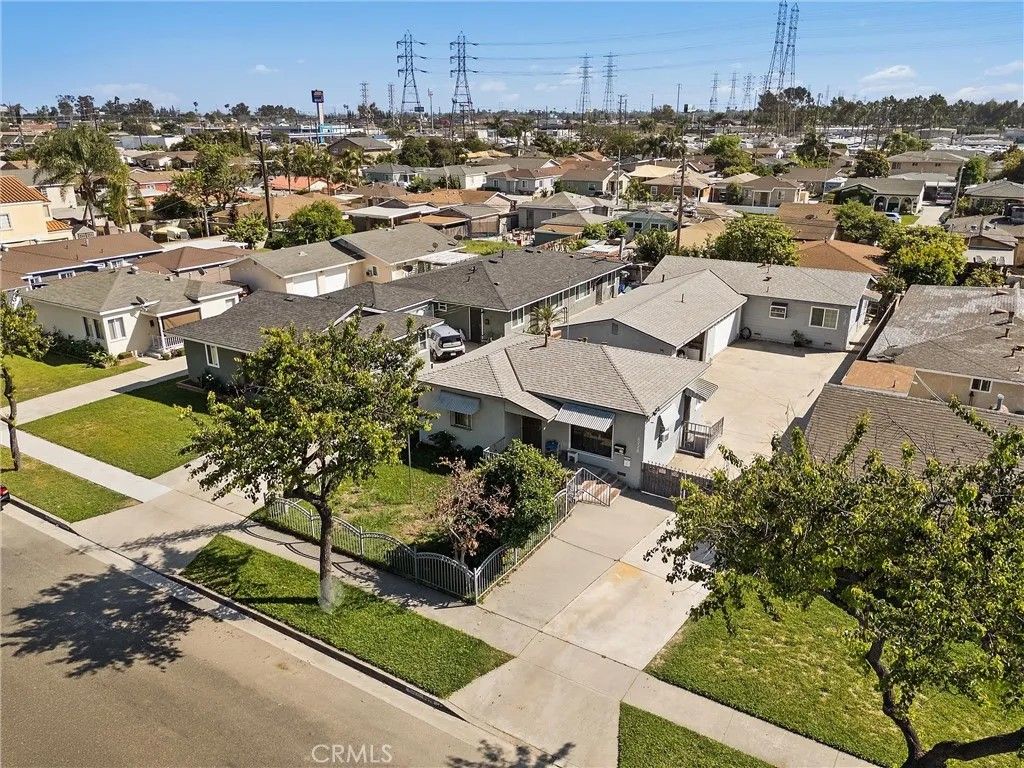 Photo of 8728 Flower St, Bellflower, CA 90706 (MLS # SW26064429)