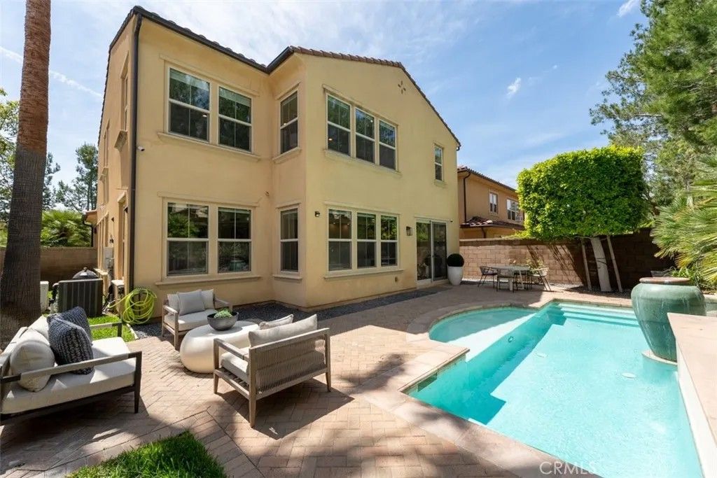 Photo of 65 Ranchland, Irvine, CA 92618 (MLS # NP26073803)