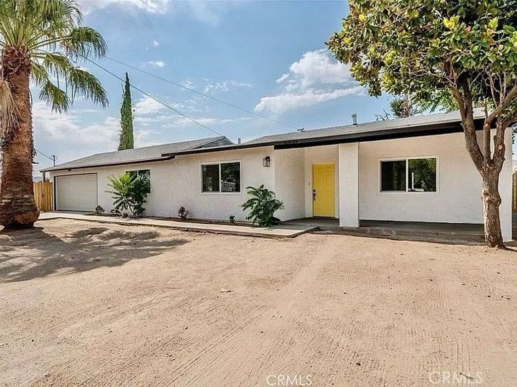 Photo of 56393 Coyote Trl, Yucca Valley, CA 92284 (MLS # CV26001039)
