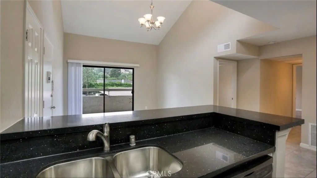 Photo of 25019 Peachland Avenue #234, Newhall, CA 91321 (MLS # SR26017965)