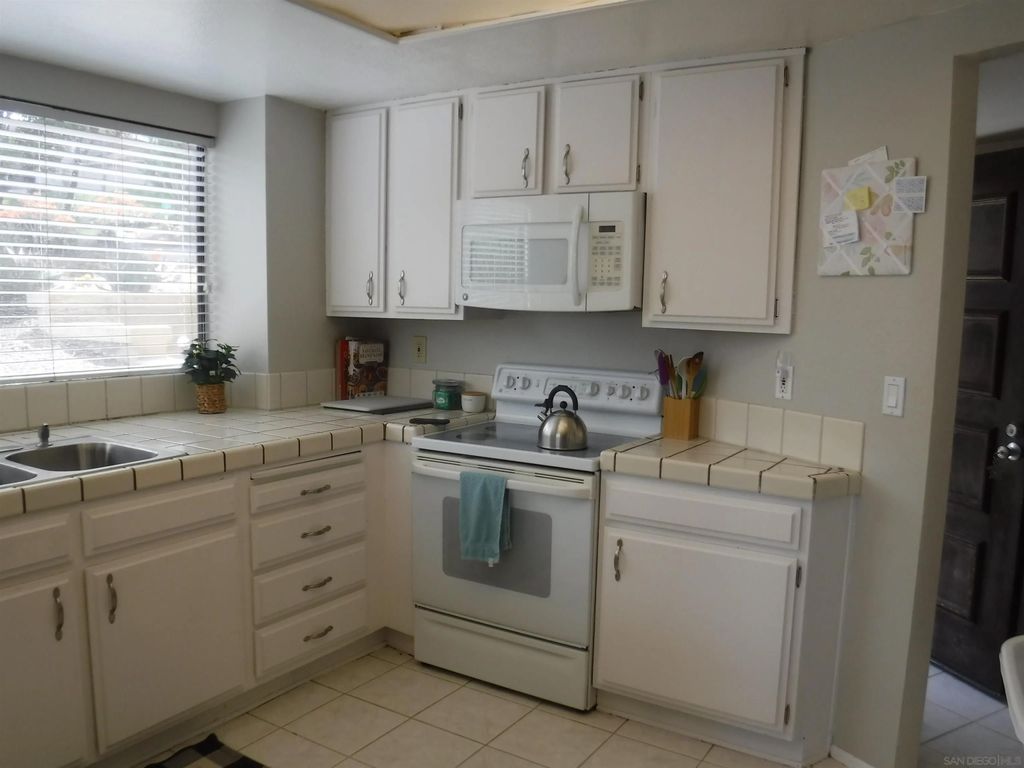 Photo of 11842 Paseo Lucido #69, San Diego, CA 92128 (MLS # 260005395)