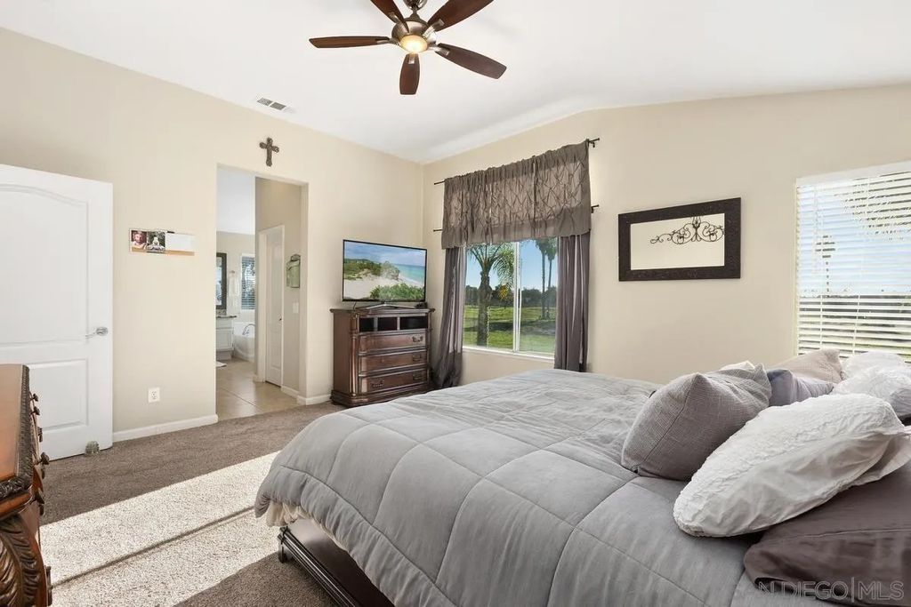 Photo of 4801 Cardiff Bay Drive, Oceanside, CA 92057 (MLS # 250045548)