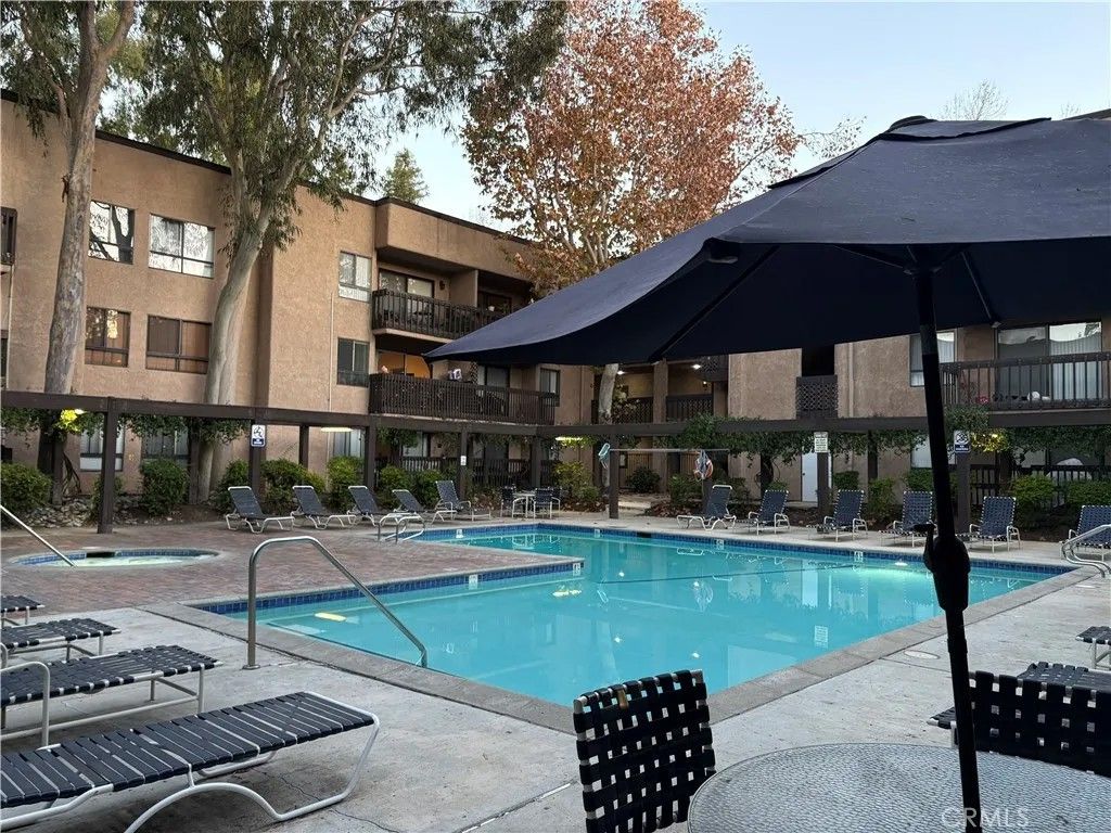 Photo of 22100 Burbank #106 A, Woodland Hills, CA 91367 (MLS # SR26018629)