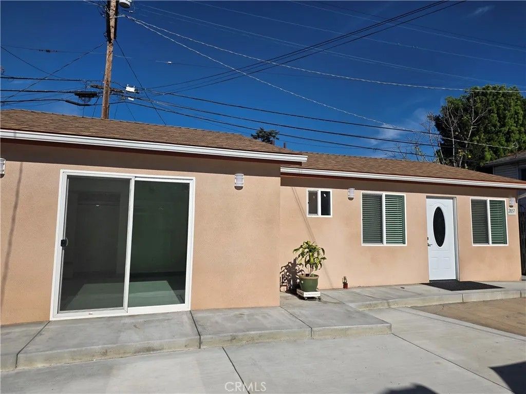 Photo of 2057 W Norwalk Avenue, Los Angeles, CA 90041 (MLS # GD26004464)