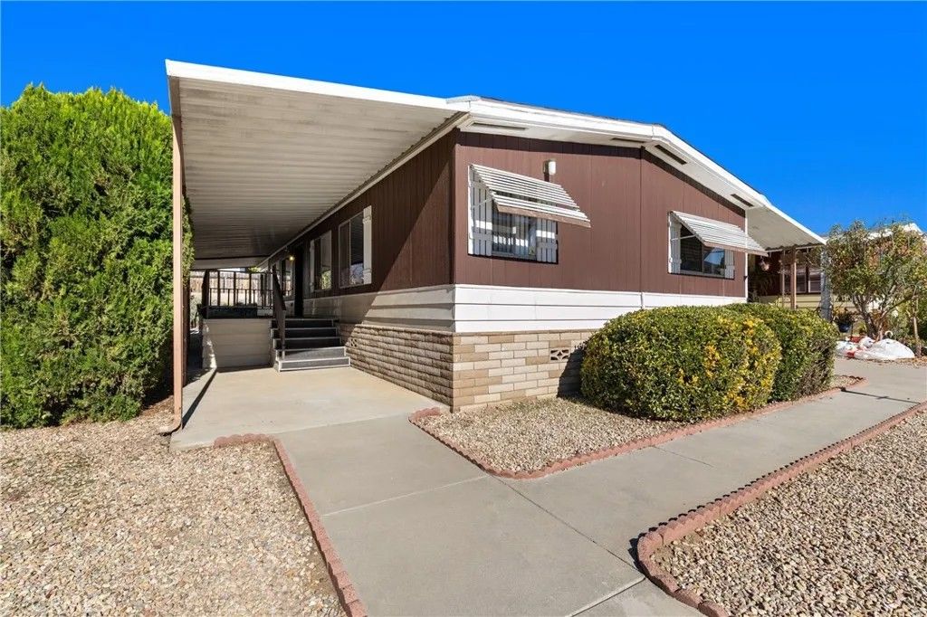 Photo of 30810 Paradise Palm Avenue, Homeland, CA 92548 (MLS # SW25278564)