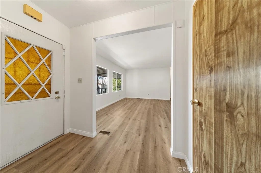 Photo of 30810 Paradise Palm Avenue, Homeland, CA 92548 (MLS # SW25278564)