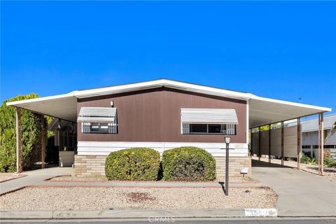 Photo of 30810 Paradise Palm Avenue, Homeland, CA 92548 (MLS # SW25278564)