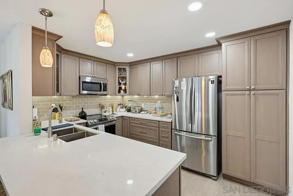 Photo of 10300 Caminito Cuervo #48, San Diego, CA 92108 (MLS # 260009330)