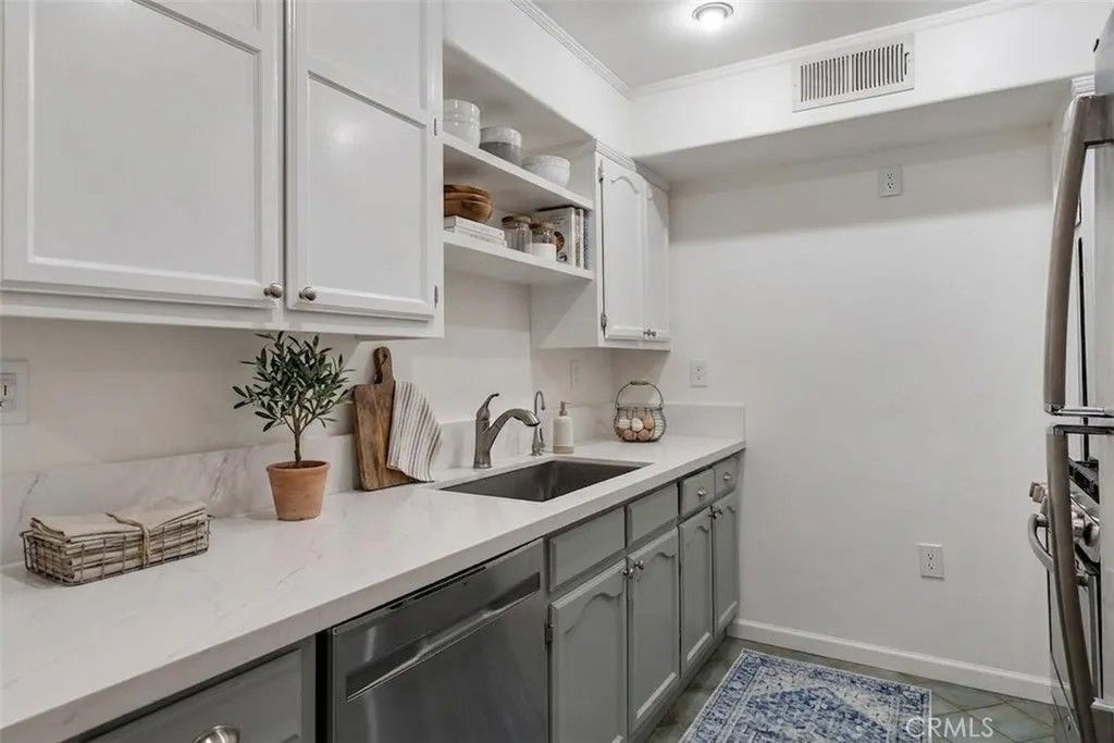 Photo of 1434 S Point View, Los Angeles, CA 90035 (MLS # OC26024637)