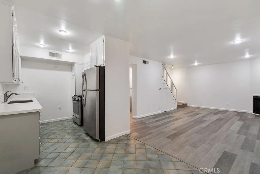 Photo of 1434 S Point View, Los Angeles, CA 90035 (MLS # OC26024637)