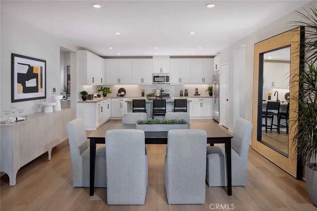 Photo of 12925 Paradiso Drive #205, Eastvale, CA 92880 (MLS # OC26012424)