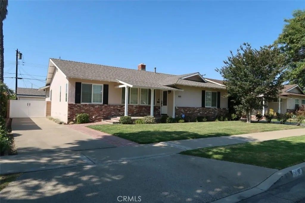 Photo of 1419 E Madison Avenue, Orange, CA 92867 (MLS # OC26012737)