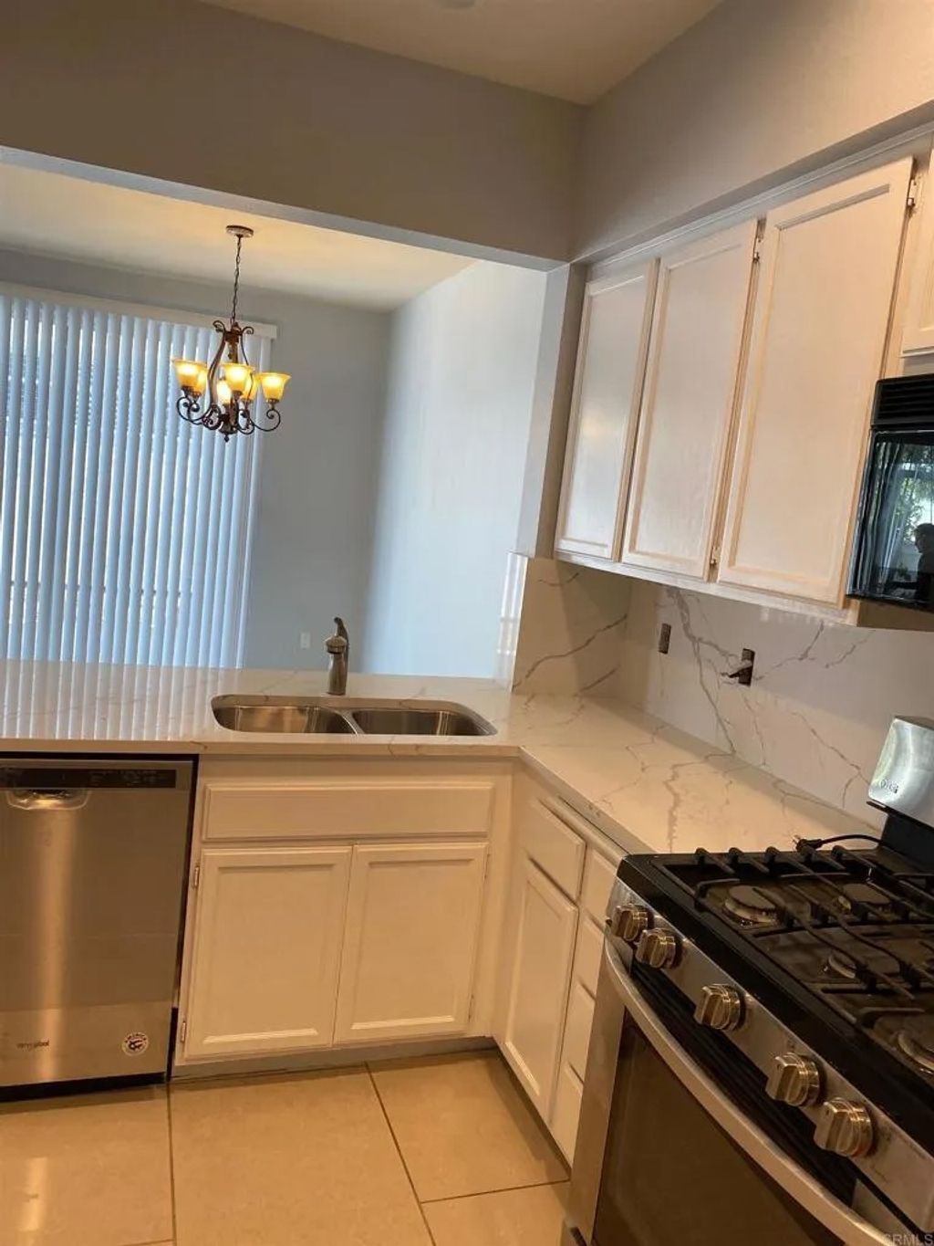 Photo of 13613 Tiverton Road, San Diego, CA 92130 (MLS # NDP2601547)