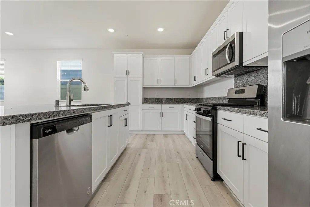 Photo of 1796 Park Place Lane, Riverside, CA 92501 (MLS # OC25268856)