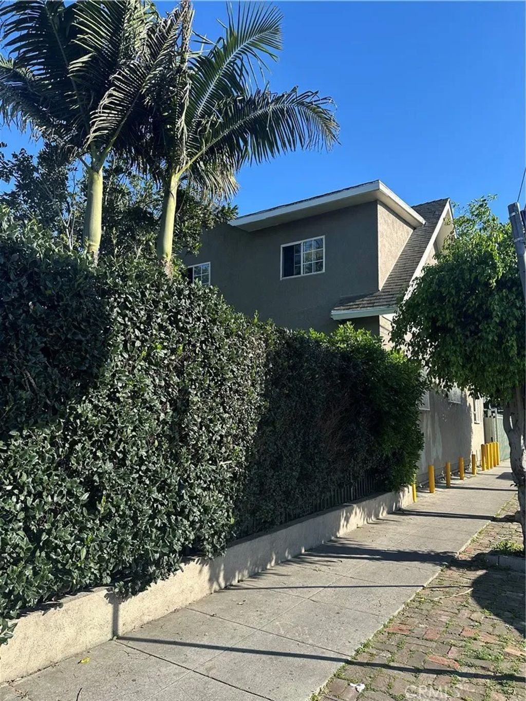 Photo of 736 W 41st Place, Los Angeles, CA 90037 (MLS # DW26081633)