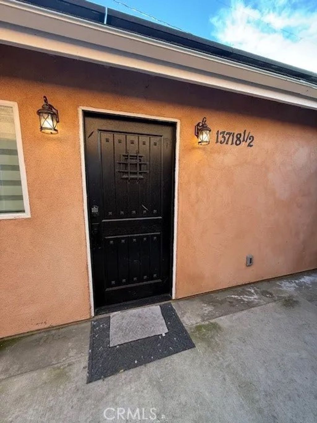 Photo of 13718 Hanwell Ave #2, Bellflower, CA 90706 (MLS # PW26012771)