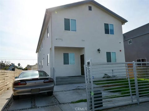 Photo of 134 E 104th ST, Los Angeles, CA 90003 (MLS # CV26213654)