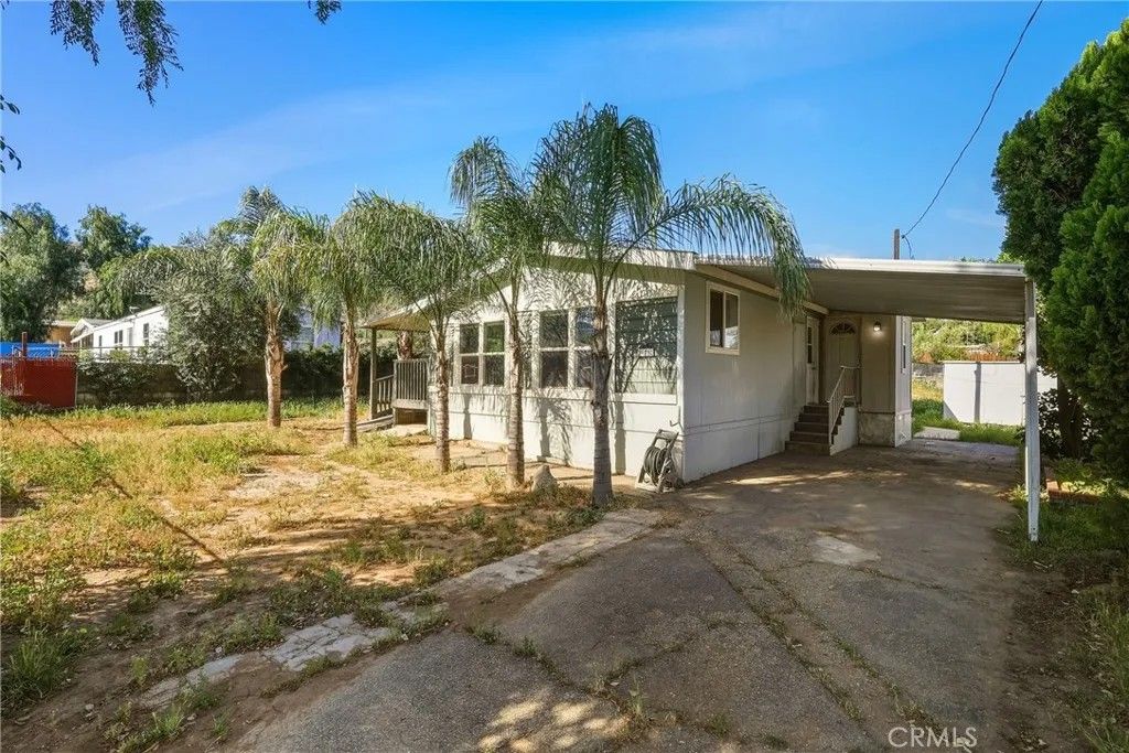 Photo of 26251 Olson Ave, Homeland, CA 92548 (MLS # SW26068141)