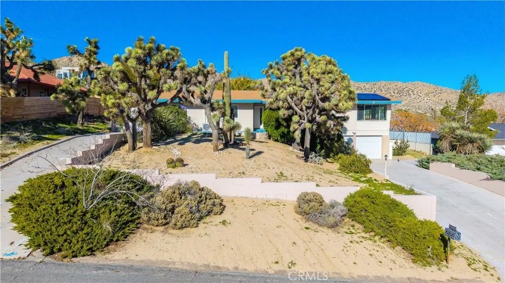 Photo of 54660 Benecia Trail, Yucca Valley, CA 92284 (MLS # JT26003024)