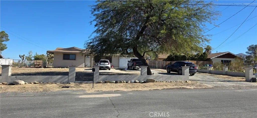 Photo of 7115 Rubidoux Ave, Yucca Valley, CA 92284 (MLS # IV26006901)