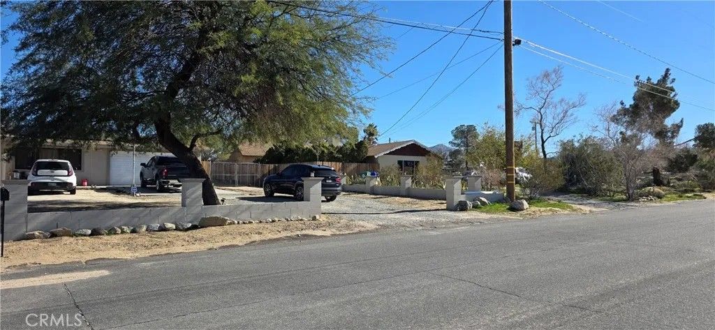 Photo of 7115 Rubidoux Ave, Yucca Valley, CA 92284 (MLS # IV26006901)