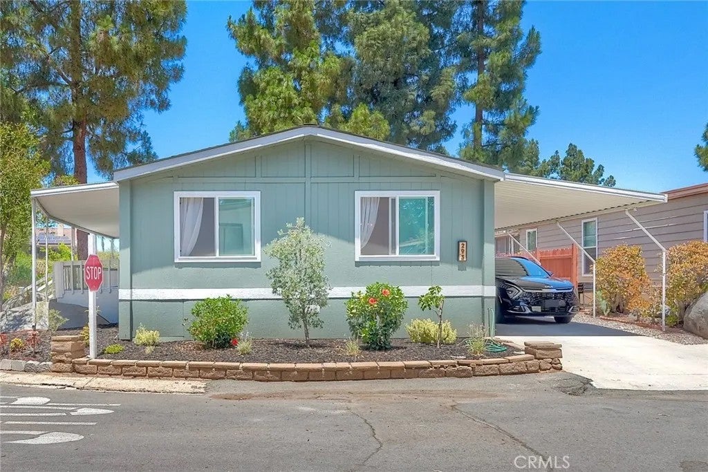 Photo of 1751 Citracado PKWY #Spc 293, Escondido, CA 92029 (MLS # ND26161422)