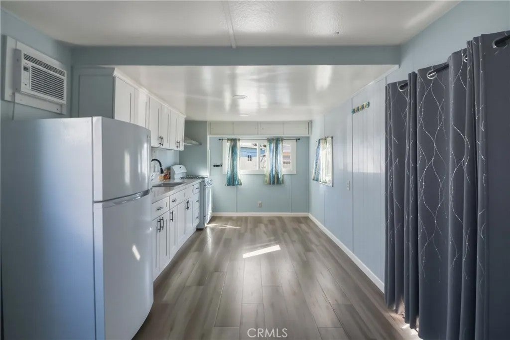 Photo of 9020 Somerset Blvd #19, Bellflower, CA 90706 (MLS # HD26111387)