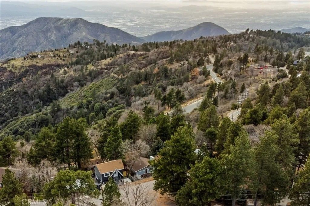 Photo of 31353 Marcella Dr, Running Springs, CA 92382 (MLS # IG26024428)