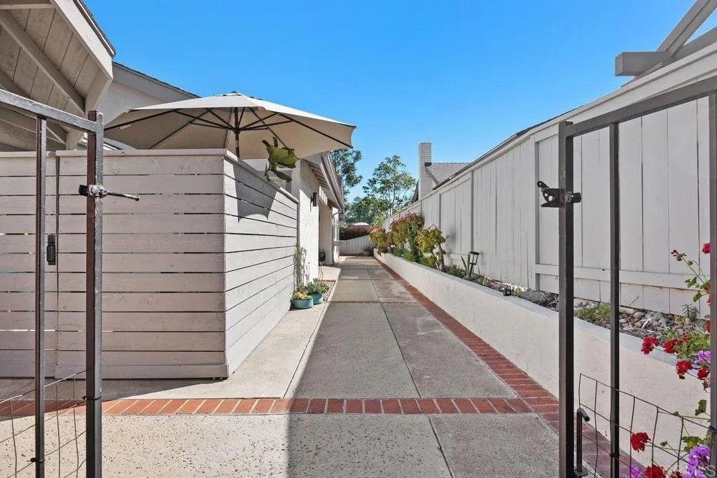 Photo of 1619 Via Entrada Del Lago, San Marcos, CA 92078 (MLS # NDP2602640)