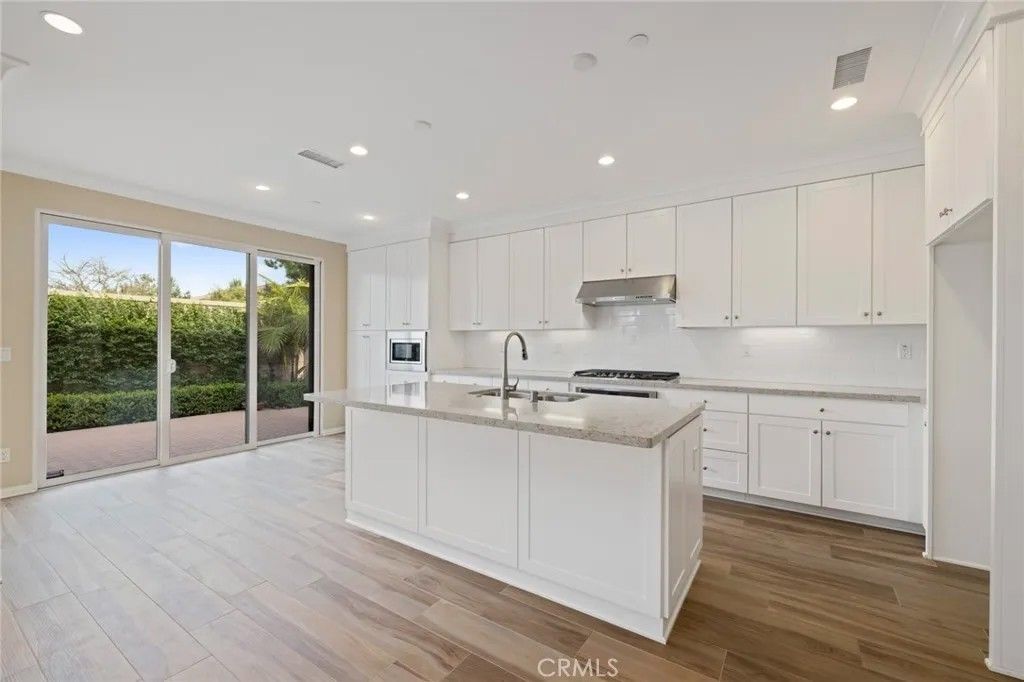 Photo of 133 Waterleaf, Irvine, CA 92618 (MLS # OC25268470)