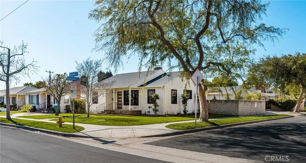 Photo of 1949 Chatwin Avenue, Long Beach, CA 90815 (MLS # OC26012592)