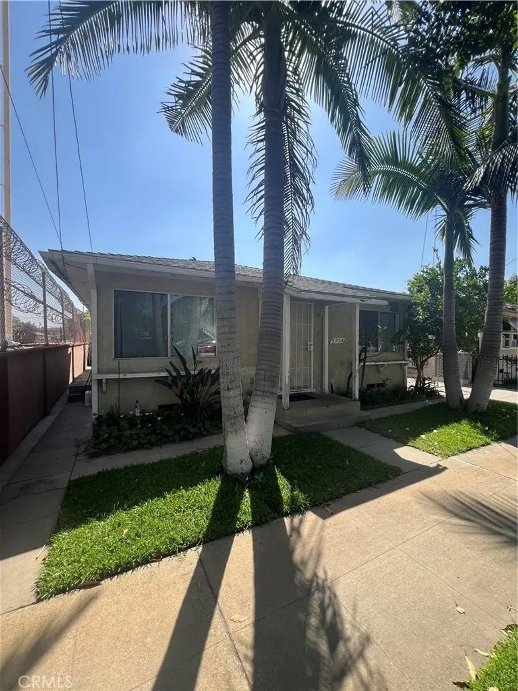 Photo of 5954 Riverside Ave, Huntington Park, CA 90255 (MLS # DW26076650)