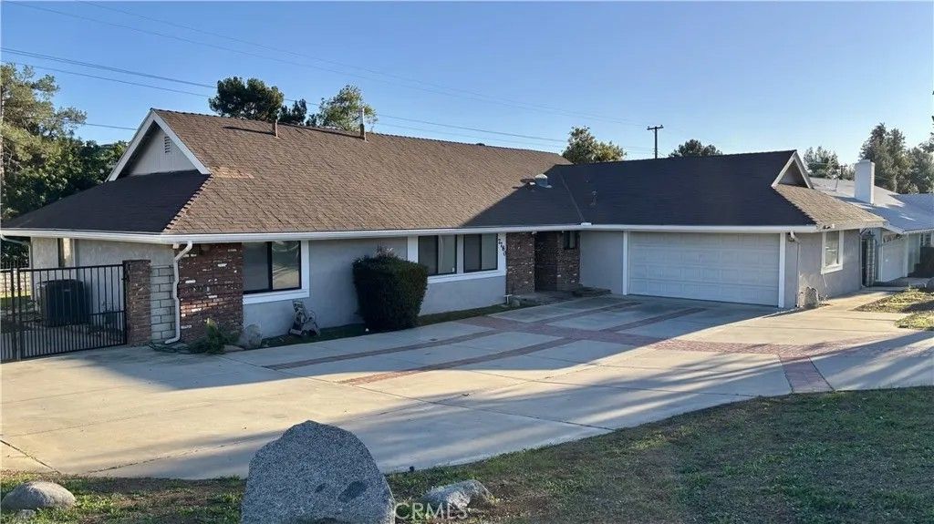 Photo of 7780 Bolero Dr, Jurupa Valley, CA 92509 (MLS # IV26019928)