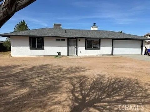 Photo of 22134 Broken Lance Rd, Apple Valley, CA 92307 (MLS # HD26059042)