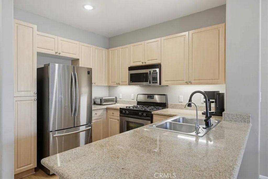 Photo of 2448 Watermarke Pl, Irvine, CA 92612 (MLS # OC26079520)