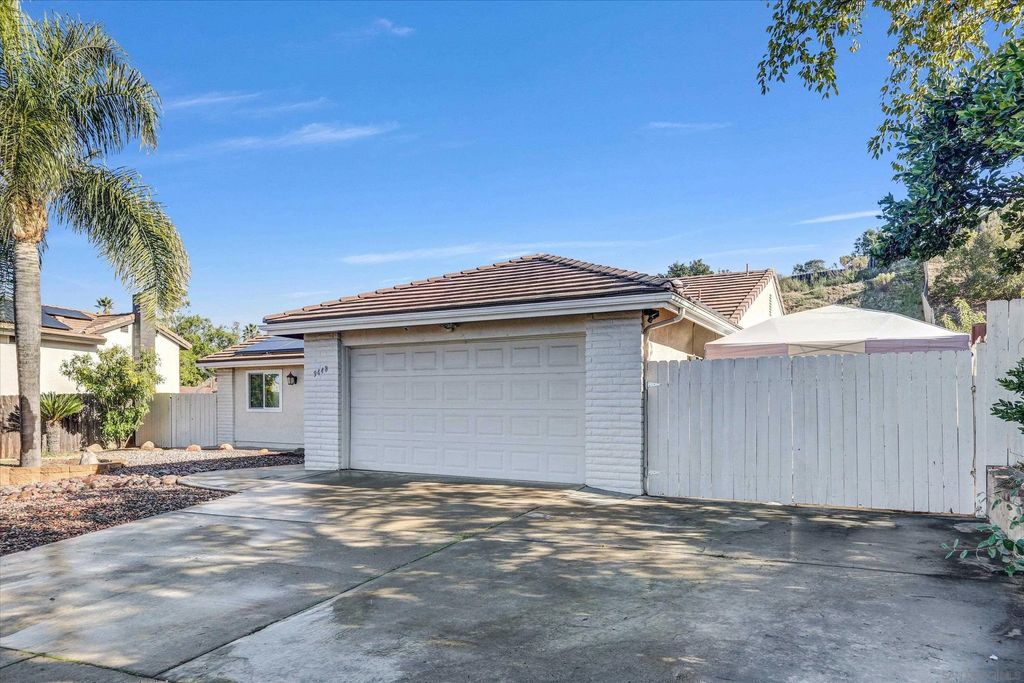 Photo of 9448 Palomino Ridge Dr, Lakeside, CA 92040 (MLS # 250046068)