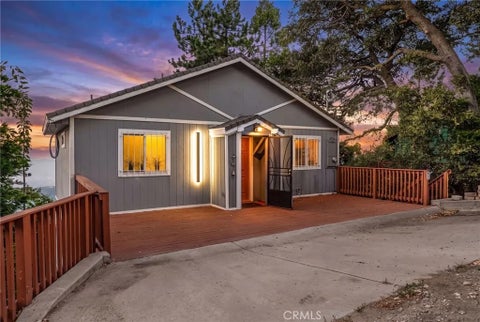 Photo of 23377 Crestview Ln, Crestline, CA 92325 (MLS # IV26145476)