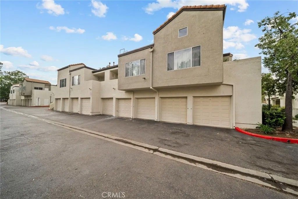 Photo of 21370 Nandina Lane #103, Newhall, CA 91321 (MLS # SR26079767)