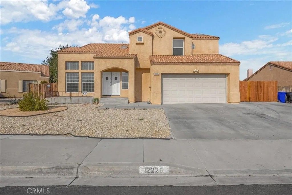 Photo of 12228 Jason Lane, Victorville, CA 92395 (MLS # IV26064062)
