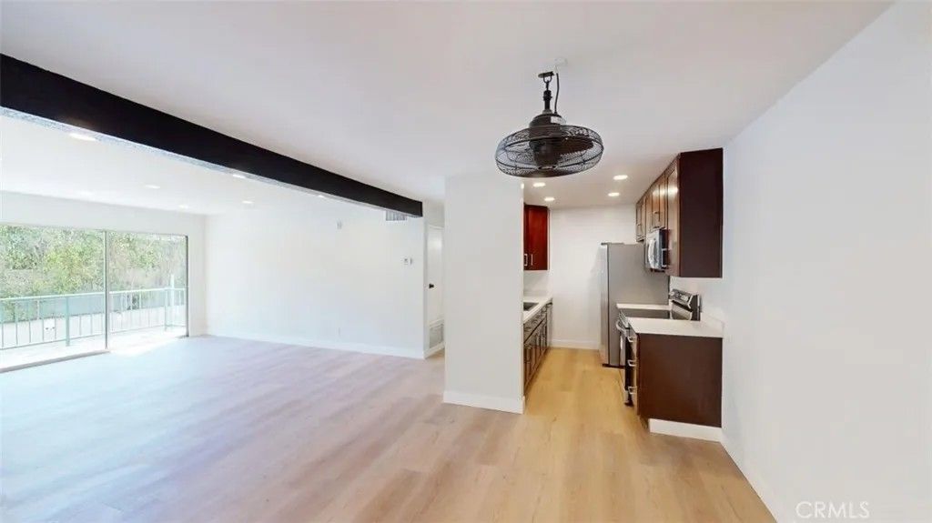 Photo of 5460 White Oak Avenue #D102, Encino, CA 91316 (MLS # SB26013453)