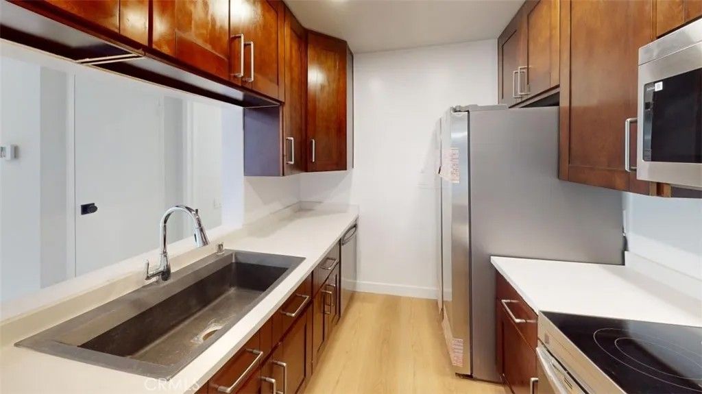 Photo of 5460 White Oak Avenue #D102, Encino, CA 91316 (MLS # SB26013453)