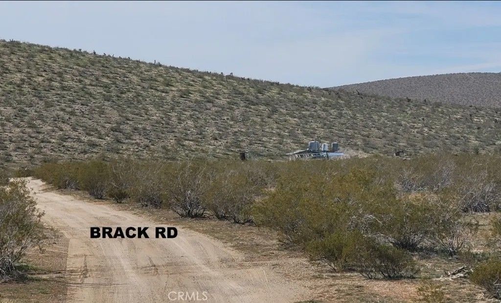 Photo of 0 Highway 247/ Brack Road, Lucerne Valley, CA 92356 (MLS # HD26063231)
